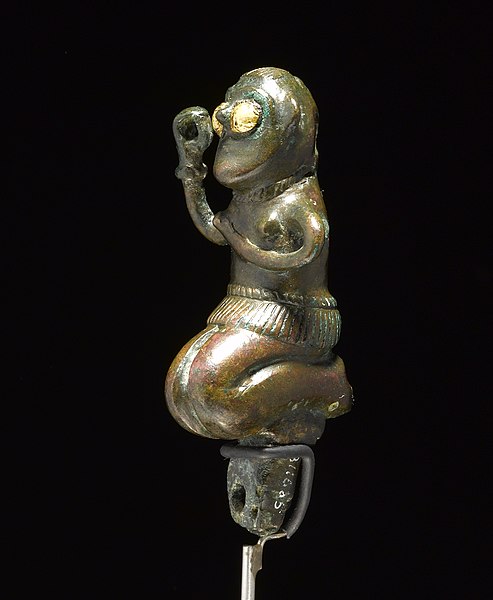 Menneskefigur fra Fårdal, Viborg Figur af kvinde i bronze fra Fårdal, Viborg amt. Br.a. per V